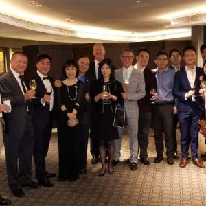previous alumni altogether in Hong Kong having a drink