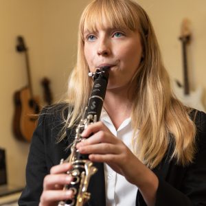 student playing the clarinet