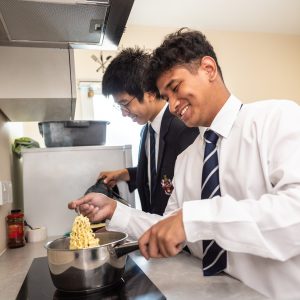 boys making noodles