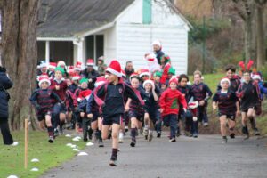 Children running in santa run