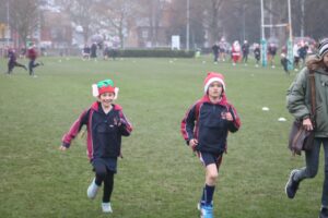 Children running in santa run