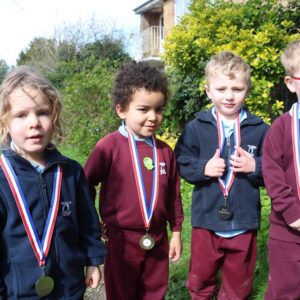 Young children with medals