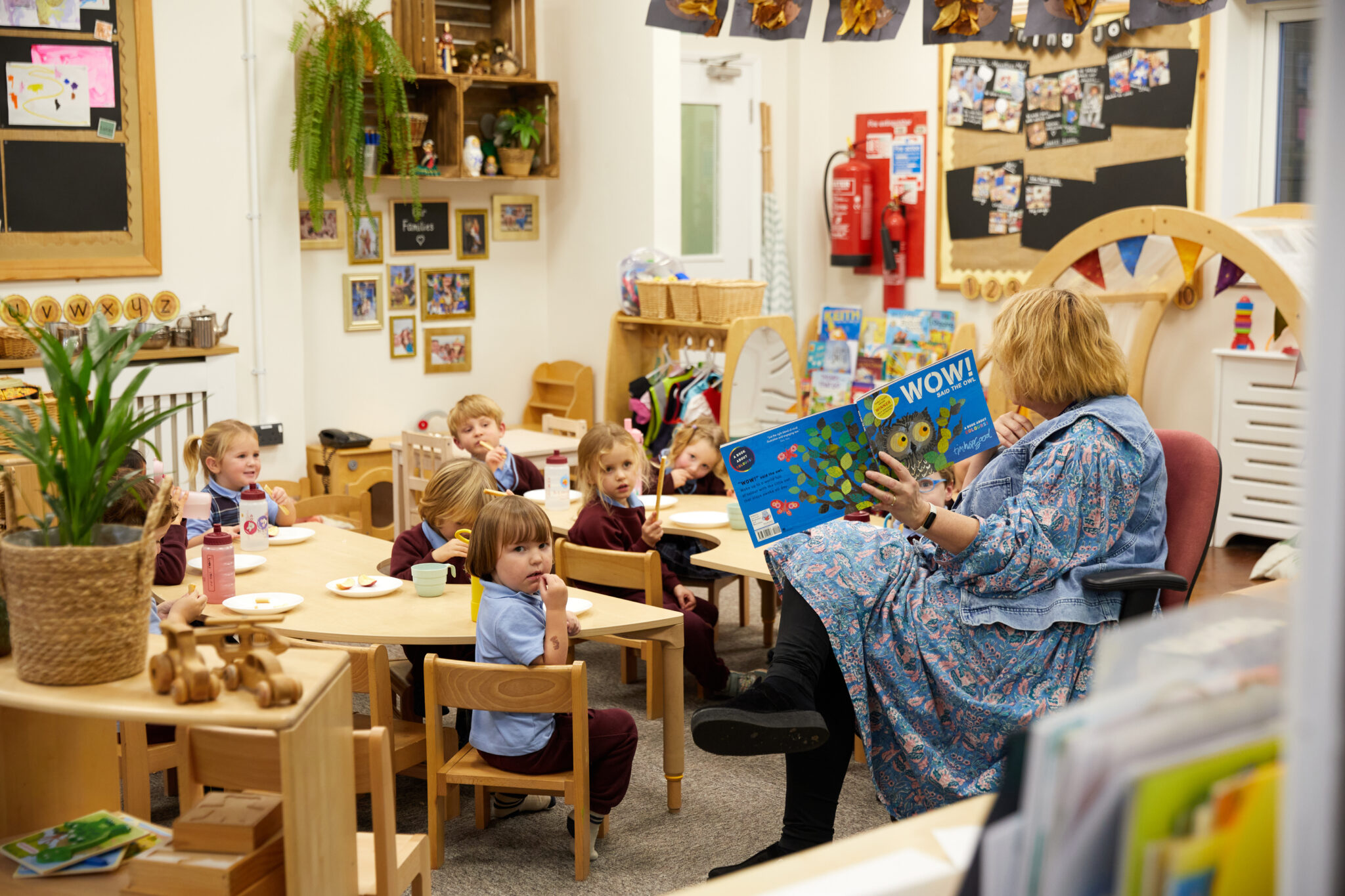 St Lawrence College teacher reads book to nursery children